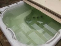 green-water-in-hot-tub